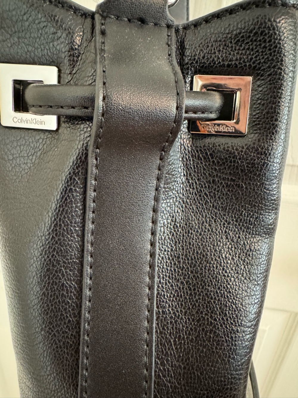 Calvin Klein Ash Drawstring Bucket Crossbody Bag in Black with Silver Hardware - Picture 4 of 13